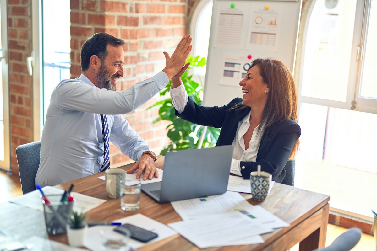 Service professionals working together in an office